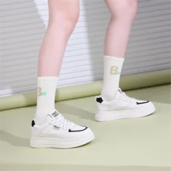 Nuui Chunky White Sneakers with Black Trim